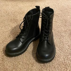 Brand New black combat boots. Wide width, women’s size 9.5. Torrid